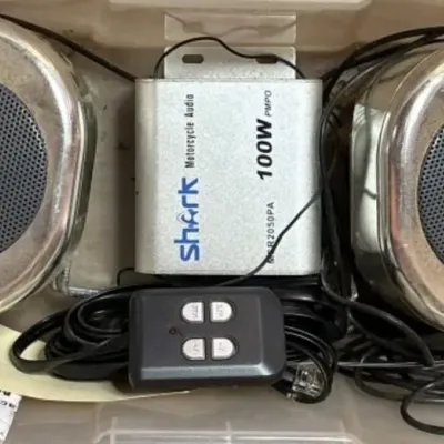 Sale Photo Thumbnail #611: Lot 715: Shark motorcycle audio set