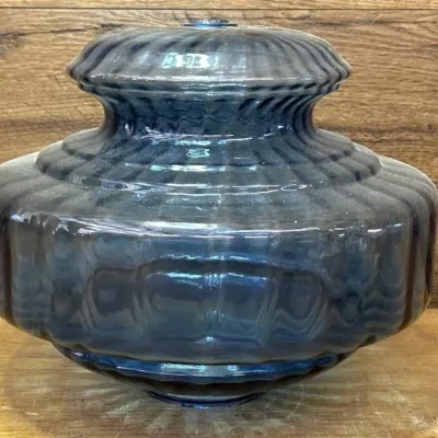 Sale Photo Thumbnail #554: Lot 654: Vntg blue ribbed glass lamp base or hurricane globe vintage blue ribbed glass lamp base or hurricane globe, resembling mid-century lighting pieces such as a Carl Falkenstein style blue bubble/ribbed lamp base