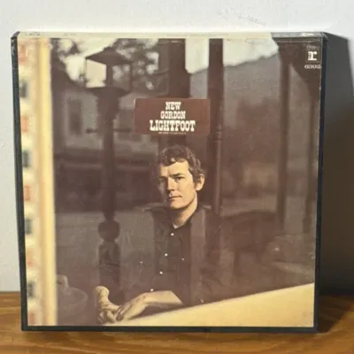 Sale Photo Thumbnail #149: Lot 220: Vntg reel to reel Gordon Lightfoot sit down young stranger