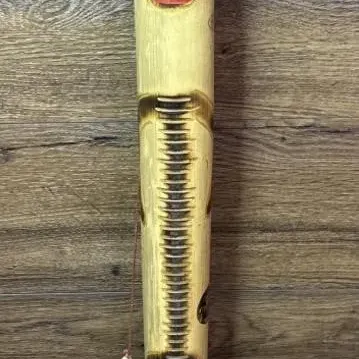 Sale Photo Thumbnail #589: Lot 693: Tribal musical bamboo stick