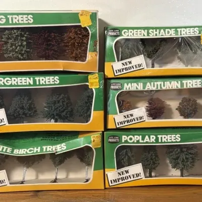 Sale Photo Thumbnail #247: Lot 318: Life Mike product miniature HO train village trees - spring, Evergreen, White Birch, green shade, mini autumn, popular trees