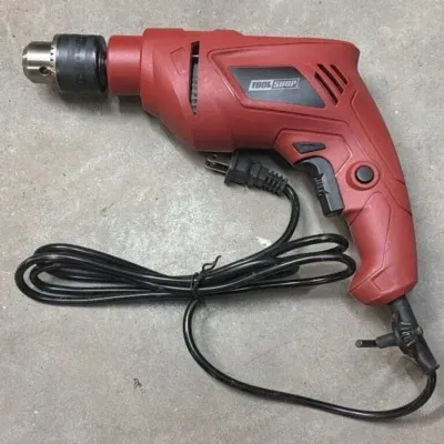Sale Photo Thumbnail #49: Lot 122: Tool shop 1/2 hammer drill - looks to be new