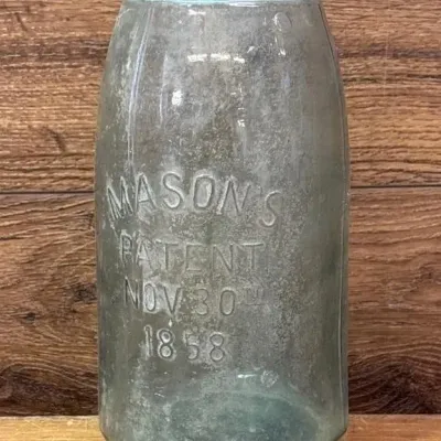Sale Photo Thumbnail #225: Lot 296: Early 1900s blue glass mason jar