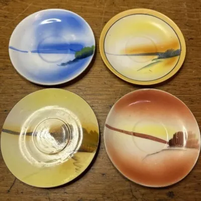 Sale Photo Thumbnail #646: Lot 750: Lusterware tea cup plates