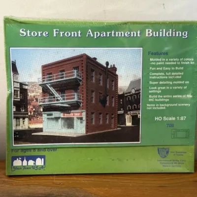Sale Photo Thumbnail #269: Lot 340: IHC HO toy train building - storefront apartment - unopened