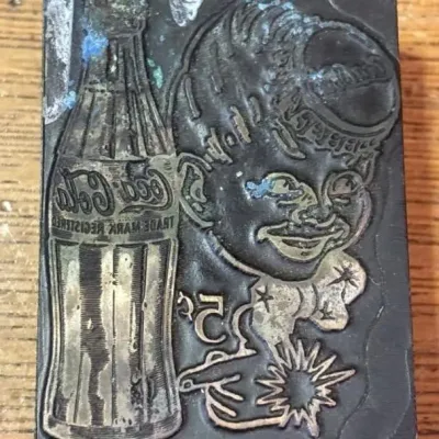 Sale Photo Thumbnail #324: Lot 425: 1940s Coca-Cola letterpress printing block