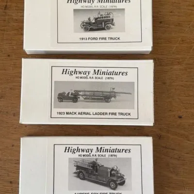 Sale Photo Thumbnail #296: Lot 368: HO railroad scale highway miniature fire trucks