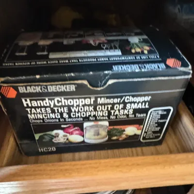 Sale Photo Thumbnail #225: Vintage Black & Decker HandyChopper mincer/chopper model HC20 in its original box, stored inside a wooden cabinet.