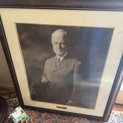 Sale Photo Thumbnail #40: Large framed black and white portrait photo of a man in a suit, housed in a beaded dark wood frame with a cream mat.