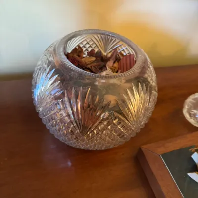 Sale Photo Thumbnail #354: Round cut crystal rose bowl with diamond and fan patterns, filled with potpourri.