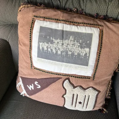 Sale Photo Thumbnail #33: Custom decorative pillow featuring a vintage team photo patch, a felt WS pennant patch, and a varsity letter appliqué.