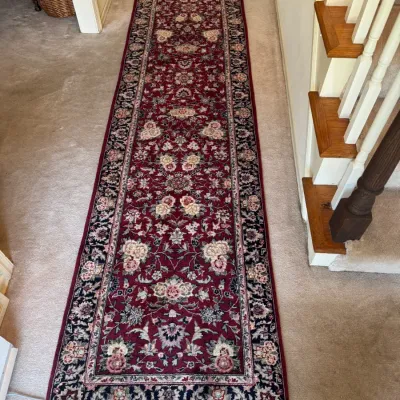 Sale Photo Thumbnail #423: Traditional Persian-style runner rug with an intricate floral pattern in shades of deep red, cream, and dark navy.