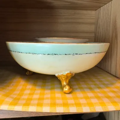 Sale Photo Thumbnail #236: Vintage hand-painted porcelain footed bowl with gilded cabriole feet and fine delicate trim.