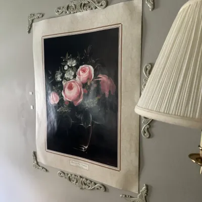 Sale Photo Thumbnail #111: Framed floral print poster featuring pink roses in a vase, framed by decorative wall molding accent pieces.