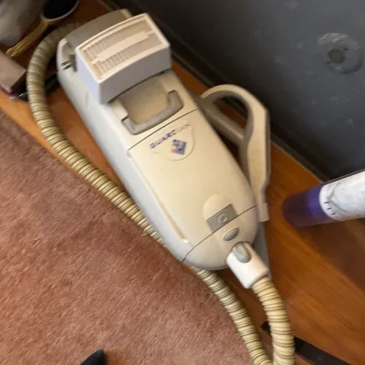 Sale Photo Thumbnail #174: Vintage Electrolux Guardian canister vacuum cleaner with flexible hose attachment.