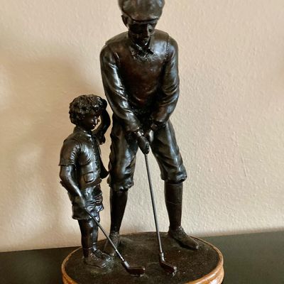 Sale Photo Thumbnail #12: Golf figure with bronze color but made of resin or similar material