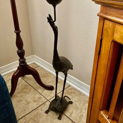 Sale Photo Thumbnail #23: Vintage patinated metal or bronze candle holder with crane or heron standing on top of a turtle