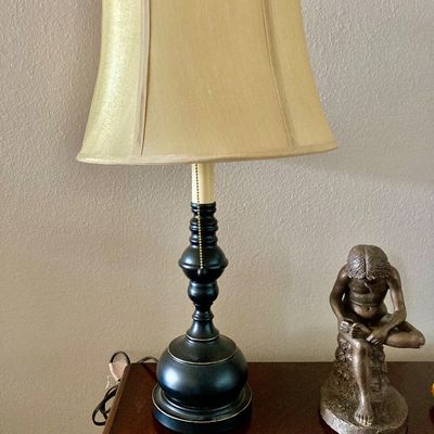 Sale Photo Thumbnail #257: Traditional table lamp featuring a dark baluster-style metal base.