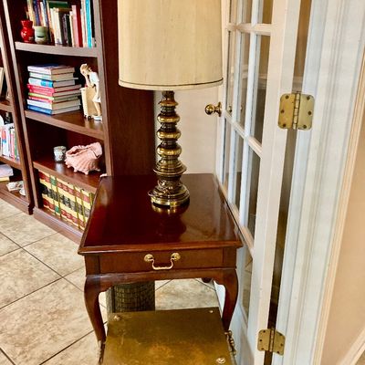 Sale Photo Thumbnail #65: Queen Anne style accent table with a brass lamp sitting on top