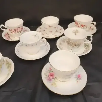 9 Porcelain/Bone China Teacups And Saucers