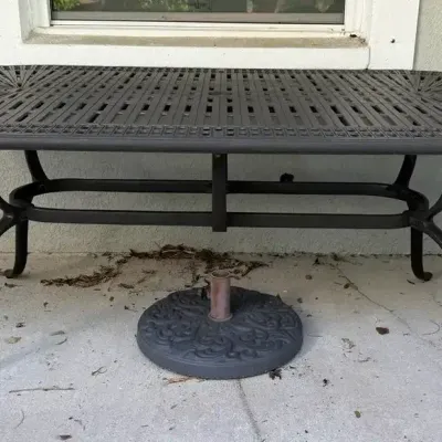 Oval Cast Aluminum Patio Dining Table With Umbrella Stand