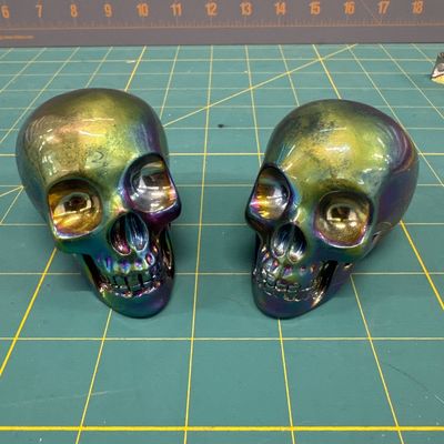 Sale Photo Thumbnail #66: Titanium skulls pair