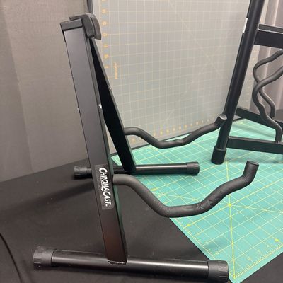 Sale Photo Thumbnail #190: Two guitar stands one rocket and one Chromecast