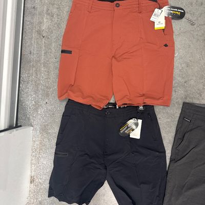 Sale Photo Thumbnail #195: Six-piece set, comes with three board shorts, size 36, one new rip curl t-shirt, one gently used rip curl t-shirt - size large, one long sleeve - size large and one hat. All in excellent condition