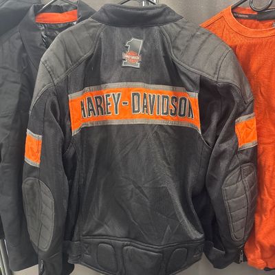 Sale Photo Thumbnail #115: 15-piece Harley Davidson set with 2 jackets and T-shirts - size extra-large, two new - size large gloves, bag and accessories. All in excellent condition
