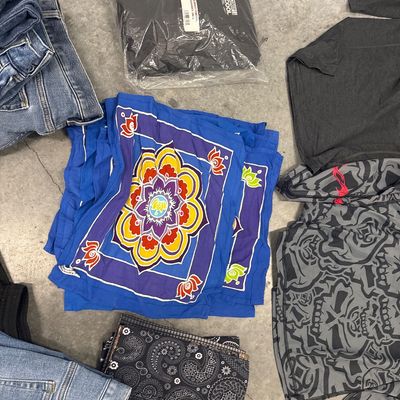 Sale Photo Thumbnail #160: 42-piece clothing set - one new, one Thermostat, seven pairs of jeans, 15 pairs of Rip Curl boardshorts, 13 scarves, 1 hoodie. All in good condition