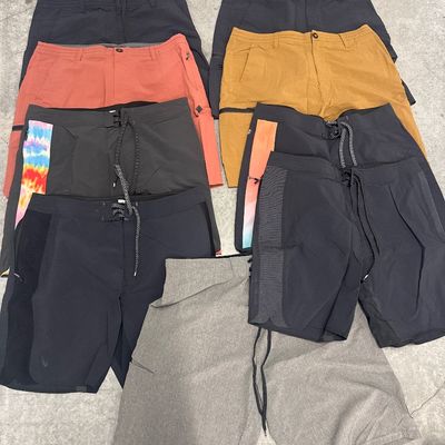 Sale Photo Thumbnail #163: 42-piece clothing set - one new, one Thermostat, seven pairs of jeans, 15 pairs of Rip Curl boardshorts, 13 scarves, 1 hoodie. All in good condition