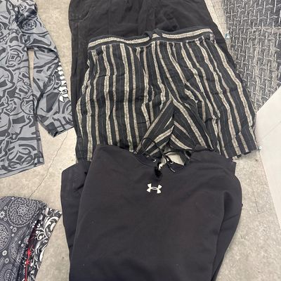 Sale Photo Thumbnail #159: 42-piece clothing set - one new, one Thermostat, seven pairs of jeans, 15 pairs of Rip Curl boardshorts, 13 scarves, 1 hoodie. All in good condition