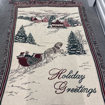 Sale Photo Thumbnail #175: 11 piece Christmas set for throw blankets one new hand towel three books one reindeer ornament one merry Christmas bag one wine stopper. All in perfect condition blankets measure approximately. 1 72x57 and 3 at 65x44.