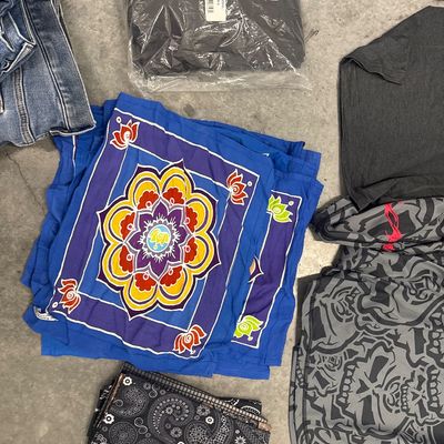 Sale Photo Thumbnail #161: 42-piece clothing set - one new, one Thermostat, seven pairs of jeans, 15 pairs of Rip Curl boardshorts, 13 scarves, 1 hoodie. All in good condition