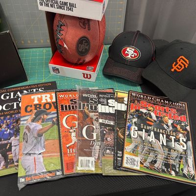 Sale Photo Thumbnail #147: 22 Piece Sports set with mitt, seven baseballs, one plastic ball, three collector balls - signed, one 49ers football - new in the box, 2 hats size large extra-large, five sports illustrated magazines, one Triple Crown one Giants of October book, all in ex