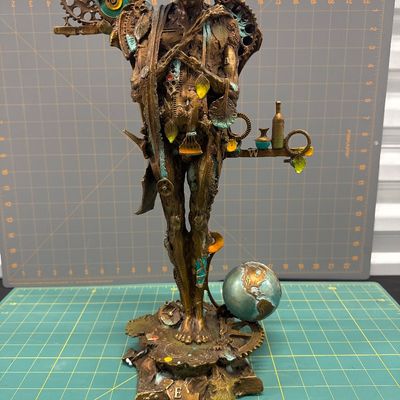 Sale Photo Thumbnail #32: Fascinating Man Dot Earth Statue. Perfect condition