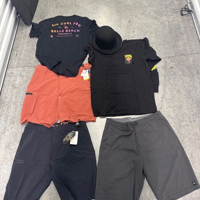 Sale Photo Thumbnail #191: Six-piece set, comes with three board shorts, size 36, one new rip curl t-shirt, one gently used rip curl t-shirt - size large, one long sleeve - size large and one hat. All in excellent condition