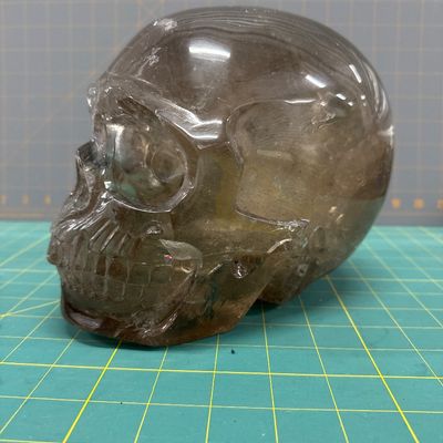 Sale Photo Thumbnail #37: Large Quartz Skull
Hand carved 
Good condition 
Comes with felt bag