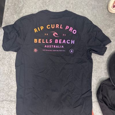 Sale Photo Thumbnail #193: Six-piece set, comes with three board shorts, size 36, one new rip curl t-shirt, one gently used rip curl t-shirt - size large, one long sleeve - size large and one hat. All in excellent condition