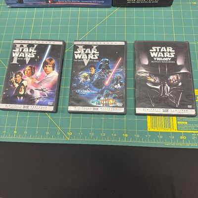 Sale Photo Thumbnail #5: Art book 
Story book 
3 movies 
Magazine
Stocking
