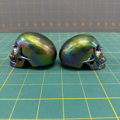 Sale Photo Thumbnail #69: Titanium skulls pair