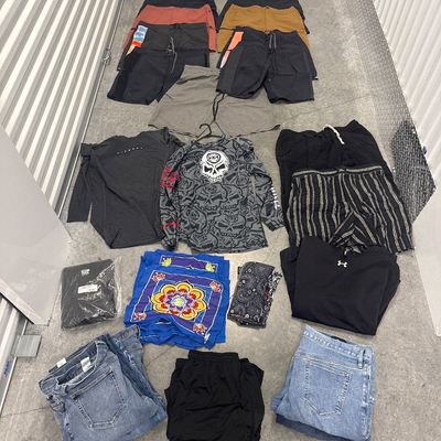 Sale Photo Thumbnail #156: 42-piece clothing set - one new, one Thermostat, seven pairs of jeans, 15 pairs of Rip Curl boardshorts, 13 scarves, 1 hoodie. All in good condition