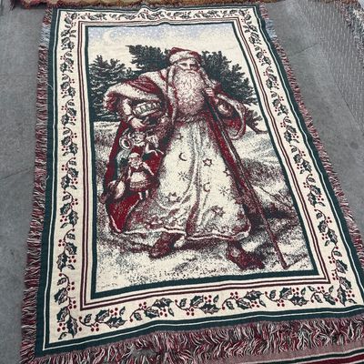 Sale Photo Thumbnail #176: 11 piece Christmas set for throw blankets one new hand towel three books one reindeer ornament one merry Christmas bag one wine stopper. All in perfect condition blankets measure approximately. 1 72x57 and 3 at 65x44.