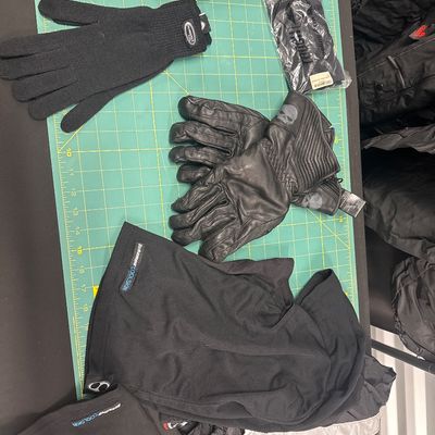 Sale Photo Thumbnail #144: 12-piece rain and cool weather, riding set with jacket, pants, size XL bag, gloves, mittens, Freezeout under helmet thermal head warmer, Airhawk seat air cushion, HD leather gloves, Olympia sport gloves, cooling arm sleeve, 2 gators, waterproof bag. All i
