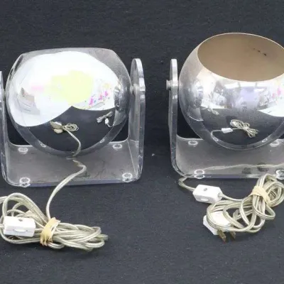 Sale Photo Thumbnail #14: Pair of mid-century modern chrome eyeball spot lamps, set on clear acrylic U-shaped bases with inline cord switches.