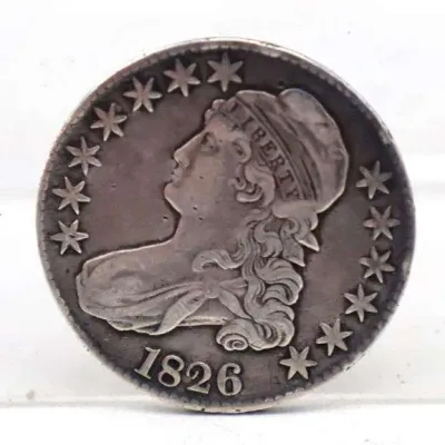 Sale Photo Thumbnail #9: 1826 Capped Bust silver half dollar obverse displaying Liberty profile surrounded by thirteen stars and date.