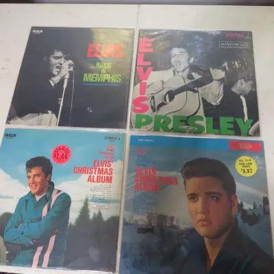 Sale Photo Thumbnail #137: Set of four vintage Elvis Presley vinyl LP record albums, including 'Back in Memphis' and 'Elvis' Christmas Album'.