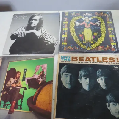 Sale Photo Thumbnail #133: Collection of four vintage vinyl LP albums from the 1960s and 1970s, including "Meet the Beatles!", The Byrds' "Sweetheart of the Rodeo", and Dave Mason & Cass Elliot.