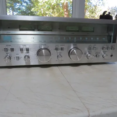 Sale Photo Thumbnail #147: Vintage Sansui G-7500 Pure Power DC stereo receiver featuring a brushed aluminum faceplate, dual power meters, and analog tuning dial.