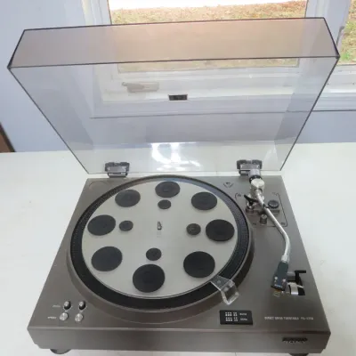 Sale Photo Thumbnail #125: Vintage Sony PS-4750 direct drive turntable with clear dust cover and original tonearm.